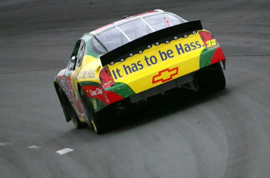 A race car detailed with an advertisement for the Hass avocado.